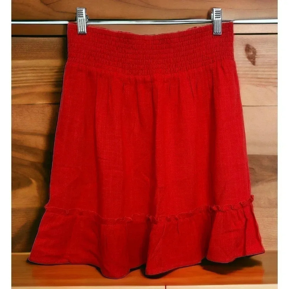 Doe & Rae smocked elastic waist ruffled knee length skirt. Size S/M